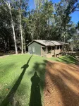 Cozy cabin in the woods.   Close to boat ramp.  Shared 5 bay boat storage