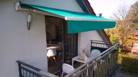 Bright apartment with balcony, centrally located