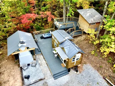Luxury Tiny House with Treehouse Bedroom and HotTub on 34acres secluded