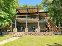 'The Lake House' on beautiful Lake Martin! Ideal location on the water.
