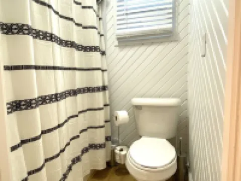 Experience History in an original Carriage House located behind a Colonial home. Hotels in Mena