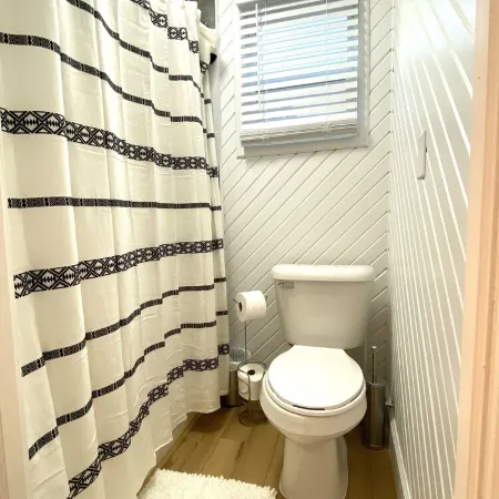 Experience History in an original Carriage House located behind a Colonial home. Hotels in Mena