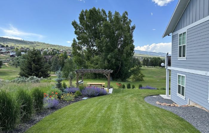 Blue Lake Retreat - fully-landscaped home sits on 2nd tee of Bear Lake G.C.