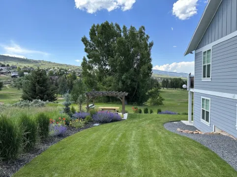Blue Lake Retreat - fully-landscaped home sits on 2nd tee of Bear Lake G.C.