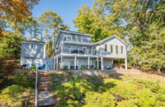 Remodeled Lake Retreat w/ expansive main lake views with amazing amenities!