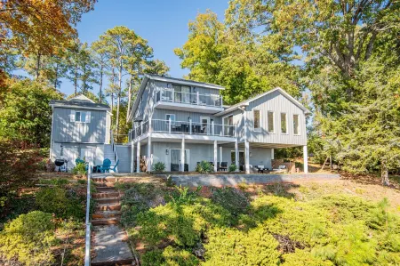 Remodeled Lake Retreat w/ expansive main lake views with amazing amenities!