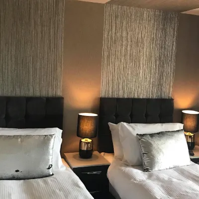 The Grotto Hotels near Sandhaven Beach