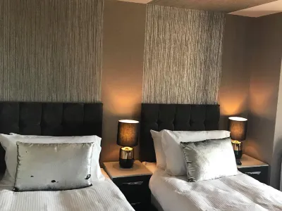 The Grotto Hotels near Sandhaven Beach
