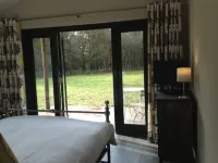 Buckstone Log Cabin with Private Grounds Nestled Into The Natural Woodland Hotels in 