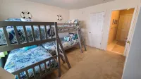 Minutes from Bethany Beach, sleeps 14, pools, golf, tennis beach shuttle & more