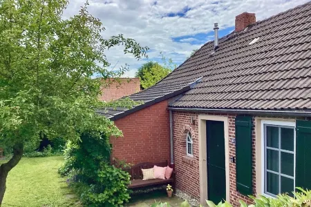 Vacation Home Tied - East Frisian Charm in a Historic Farm Worker's House for 4