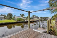 4BR Home w/ Private Dock and Fenced Backyard and Firepit. Minutes from the Beach