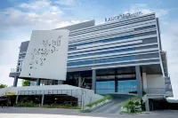 Luwansa Hotel and Convention Center Manado Отели в г. 