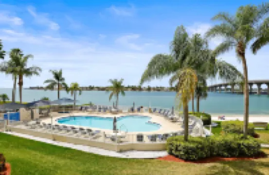 Balcony with Stunning Water Views and Pool - Gorgeous Waterfront Escape