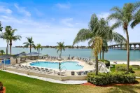 Balcony with Stunning Water Views and Pool - Gorgeous Waterfront Escape