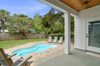 Relaxing Pool and Barbecue Area - Charming Island Oasis