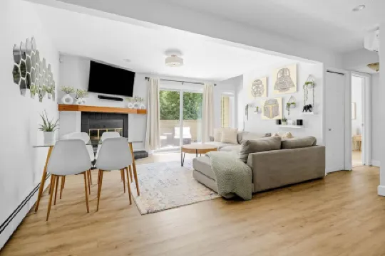 Two Balconies and Seasonal Community Pool - Bright and Airy Retreat