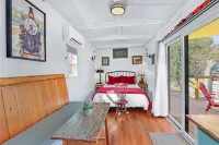 Charming Caboose Retreat with Steampunk Design - Unique and Cozy Escape