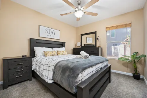 Expansive Backyard Oasis with Pool and Waterslide - Inviting Escape