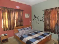 DC Bar & Suites Hotels near Oluwaga Shopping Complex