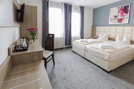 Bavaria Hotel Münchner Hof Superior Отели рядом с достопримечательностью «Унтерер Шлоссгартен»