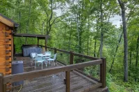 The Mighty Acorn, Bungalow is a delightful cozy tiny home in the woods.