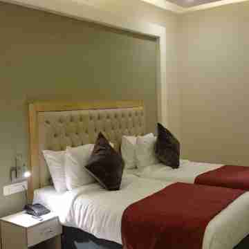 Mango Hotels Naveen Rooms