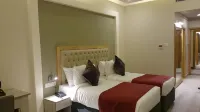 Mango Hotels Naveen Hotels in Davanagare
