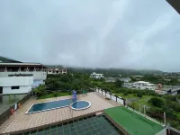 Sky High By Joy Suites Hotels in Gevhande Apati