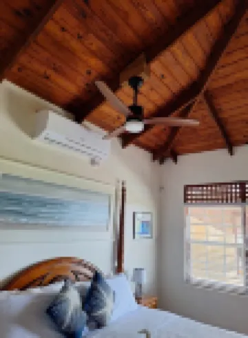 Charming Cottage Located In Cap Estate - Orchid Cottage 1 Bedroom Home by RedAwning