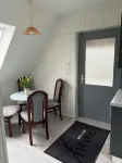 Kleine Ferienwohnung , Direkt am Deich und Hafen von Eckwarden mit Gartennutzung
