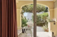 Lovely apartment with garden | Walking distance to Cala Llenya