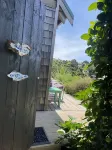 Rustic cabin, sea views, deck, bbq, kayak/SUP, wifi, 2 mins walk to beach, pets