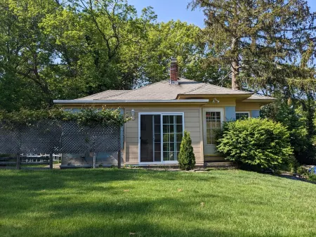 Weymouth Hill Station. Hillside cottage retreat with water views