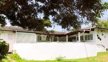 4BR Villa with pool in popular Bacolet, close to a scenic bay and Scarborough