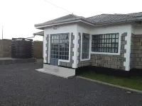 An affordable way to visit Masai Mara, stay in our cottage and enjoy. Hotel a 