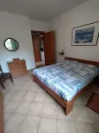 Apartment with private garden two steps from the lake.