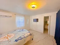Charming 3-bedroom Beach House with AC and WiFi near Arecibo's best beaches.