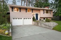 Spacious 4-bedroom in Spokane with Outdoor Entertainment + 2 outdoor playsets