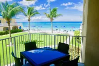 Gorgeous Ocean Views!! In the Center of 7 Mile Beach!! Walk to Most Everything!
