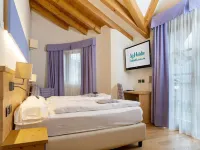 Alpholiday Dolomiti Wellness & Family Hotel Hôtels à : Commezzadura