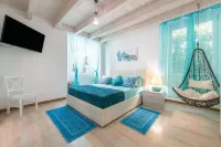 Cozy buen ritiro in the center of Carloforte inspired by the colors of the sea Hotels near San Pietro Island