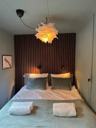 Detached wooden cottage in the forest with Sauna, Hot tub and outdoor shower