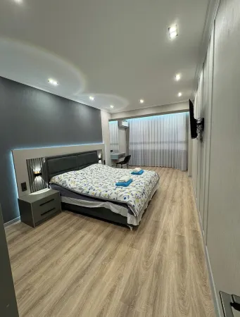 Charming 1-bedroom apartment with WiFi and AC in delightful Osh Отели в г. Ош