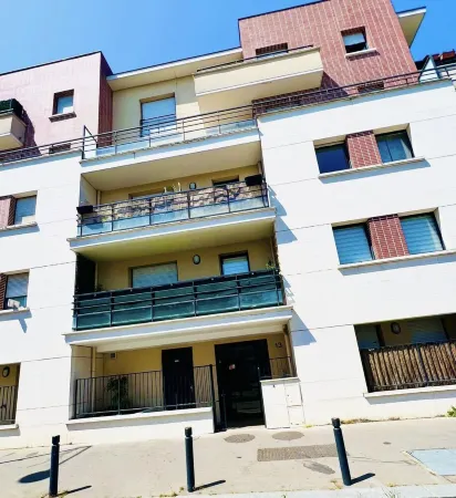 Appartement Cosy Près Stade de France Отели рядом с достопримечательностью «Groupe AFNOR»