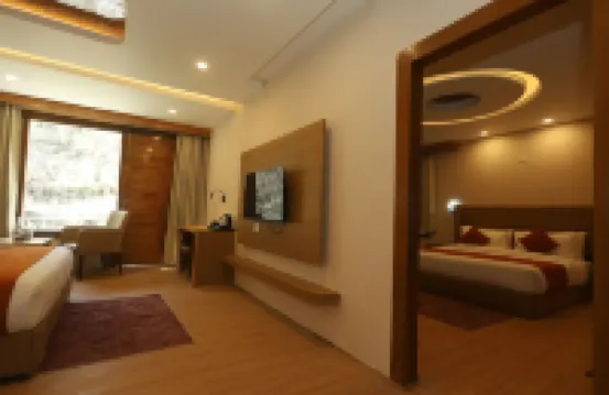 Udit Regency by West Western Kasol ( Central Heated and Air Cooled )