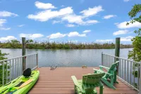 Waterfront Pink House with Private Dock & Pool - 4-Star