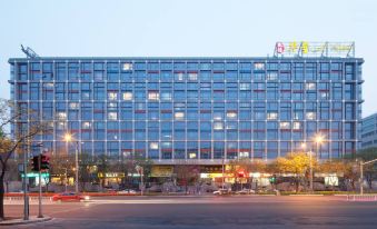 Kaide Huaxi Apartment Hotel