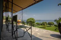 Room in Lodge - Find a Quiet Beach Resort at Rushel Kivu Resort! Hoteles en Kibuye