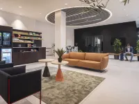Premier Suites Amsterdam Hoteles cerca de Museo Van Loon